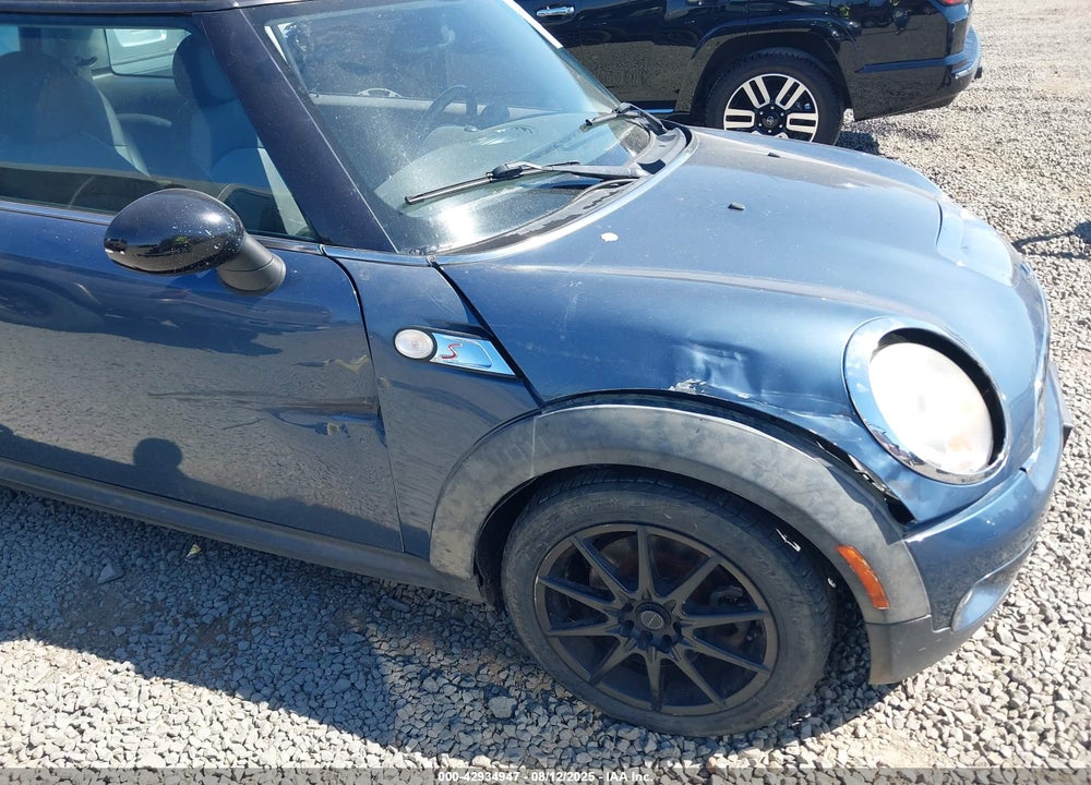 2009 MINI COOPER S VIN: WMWMF73569TW86957