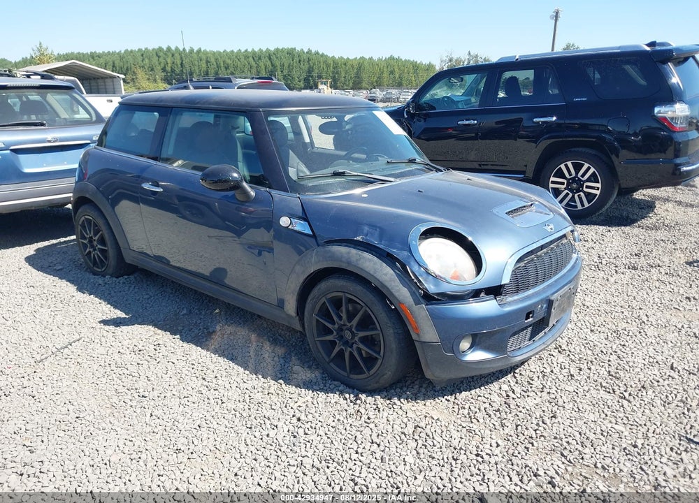 2009 MINI COOPER S VIN: WMWMF73569TW86957