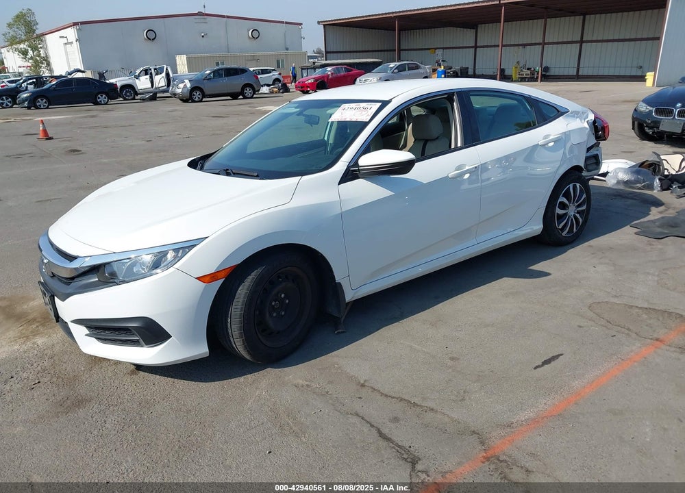 2018 HONDA CIVIC LX VIN: 19XFC2F51JE204606