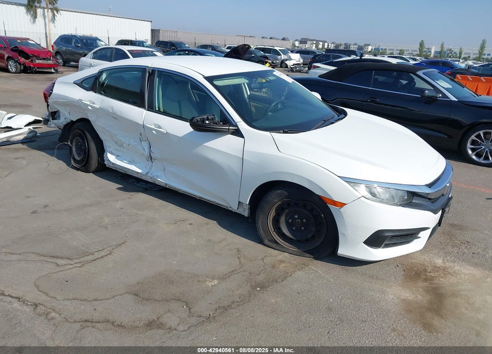 2018 HONDA CIVIC LX VIN: 19XFC2F51JE204606