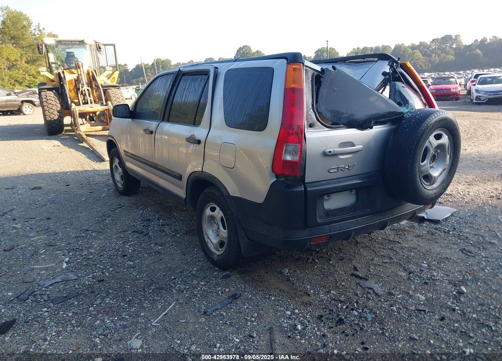 2002 HONDA CR-V LX VIN: JHLRD68412C013771