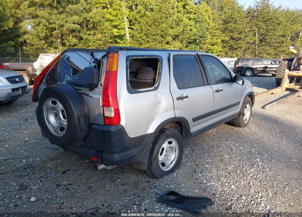 2002 HONDA CR-V LX VIN: JHLRD68412C013771