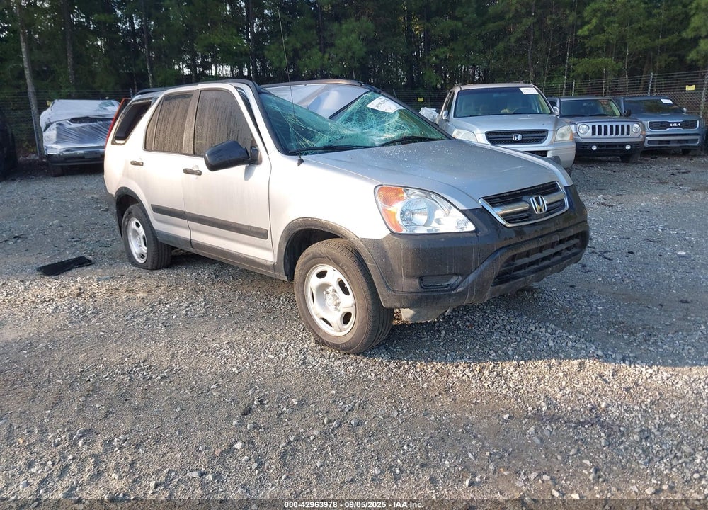2002 HONDA CR-V LX VIN: JHLRD68412C013771