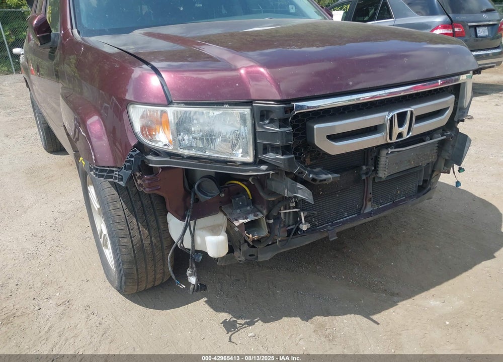 2011 HONDA RIDGELINE RTL VIN: 5FPYK1F52BB011423