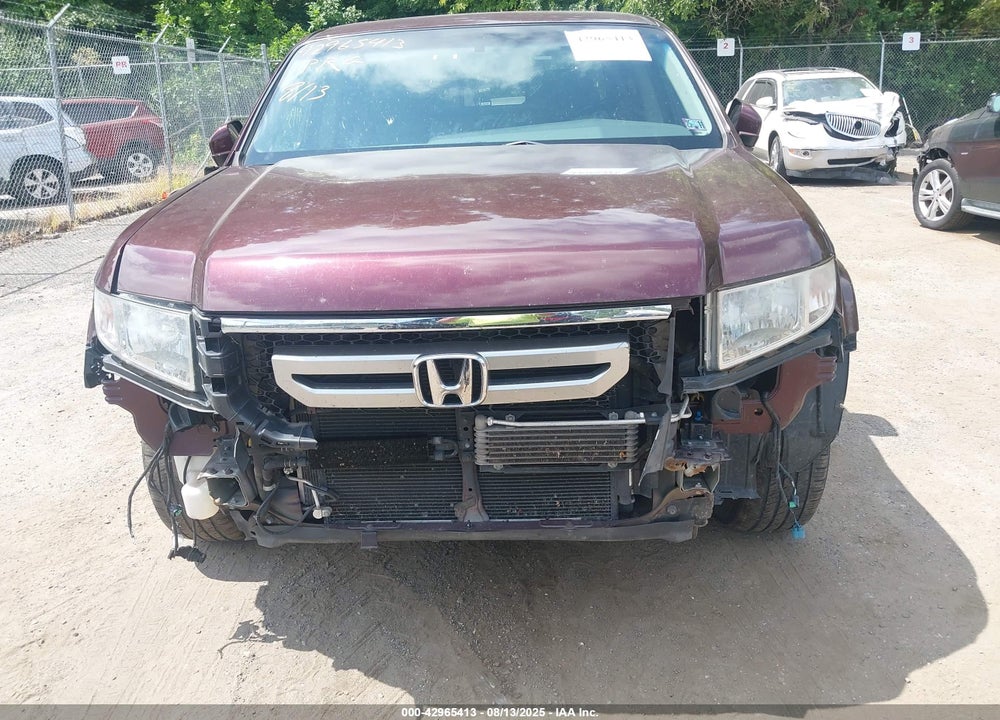 2011 HONDA RIDGELINE RTL VIN: 5FPYK1F52BB011423