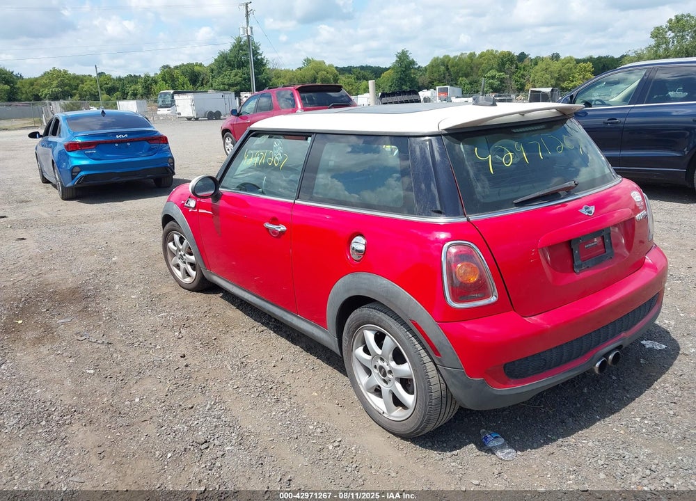 2009 MINI COOPER VIN: WMWMF73569TX40628