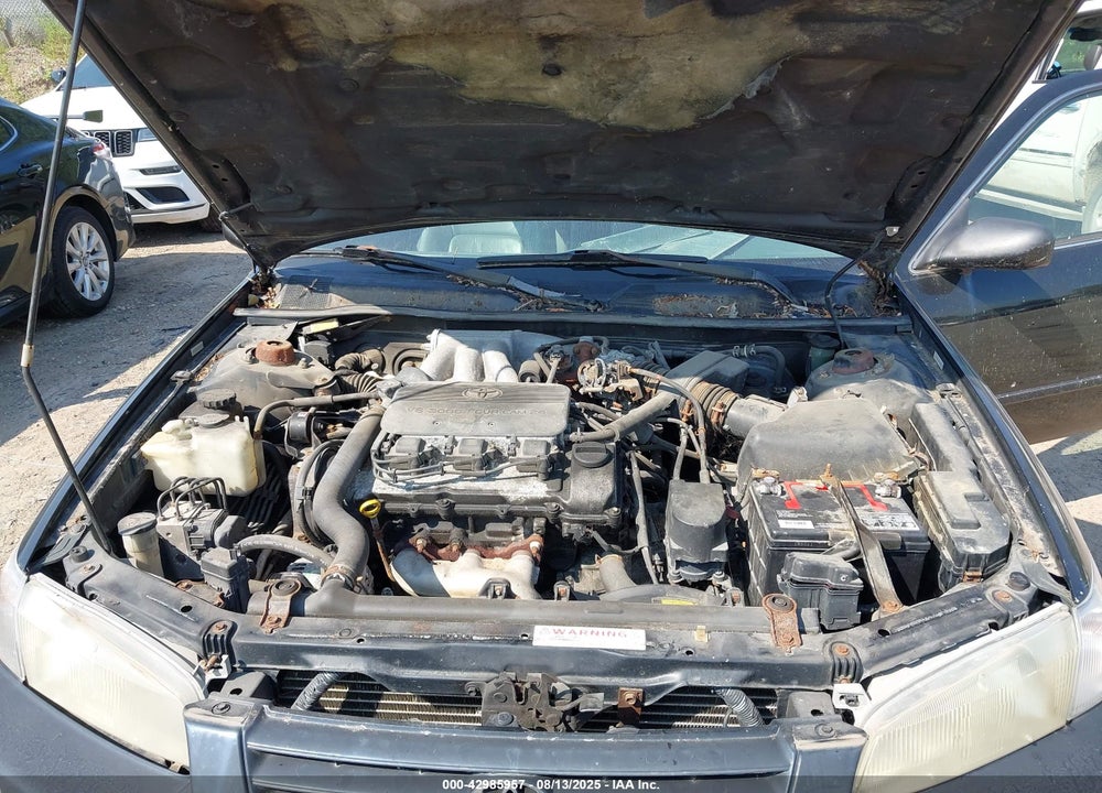 2000 TOYOTA CAMRY LE VIN: JT2BG22K1Y0433460