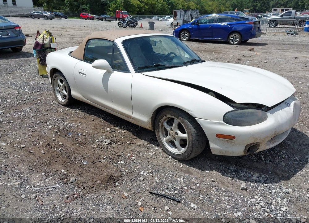1999 MAZDA MX-5 MIATA LEATHER PKG/POPULAR EQUIPMENT PKG/SPORTS PKG/TOURING PKG VIN: JM1NB3537X0106007