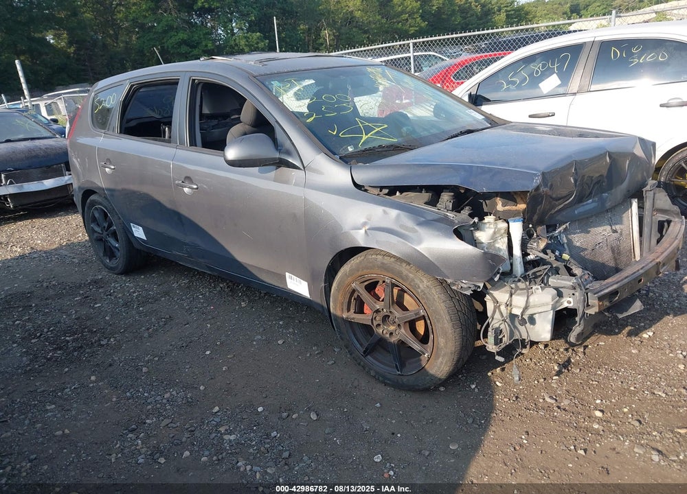 2009 HYUNDAI ELANTRA TOURING VIN: KMHDC86E09U032555