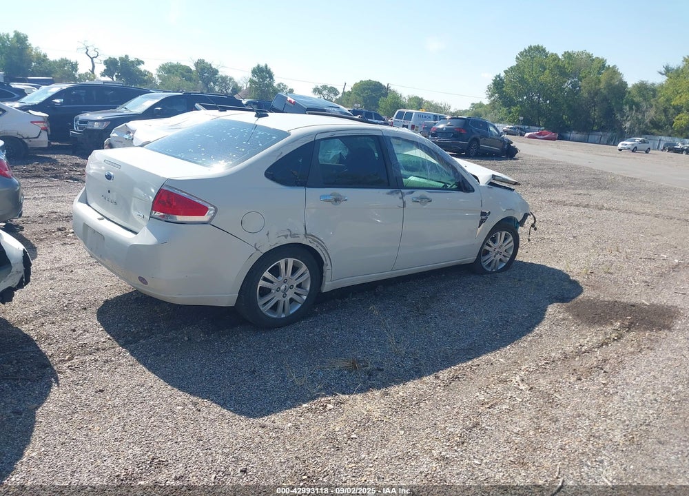 2009 FORD FOCUS VIN: 1FAHP37N99W266084