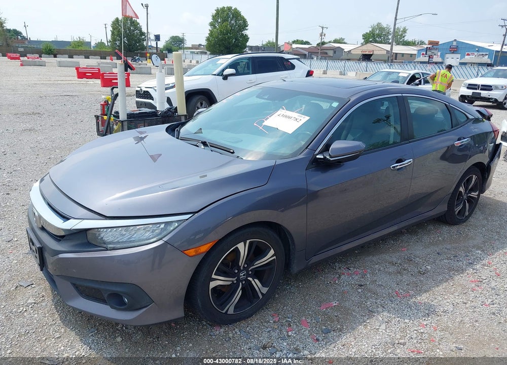 2016 HONDA CIVIC TOURING VIN: 19XFC1F95GE031064