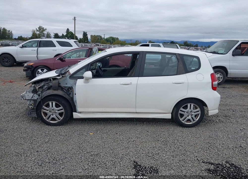 2007 HONDA FIT VIN: JHMGD38637S018423