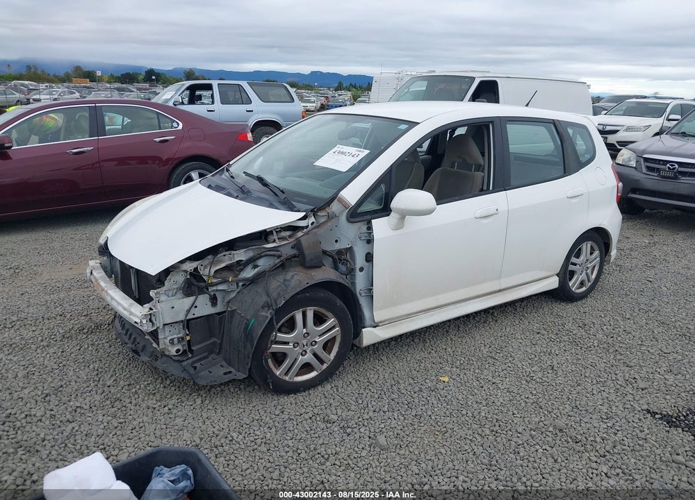 2007 HONDA FIT VIN: JHMGD38637S018423
