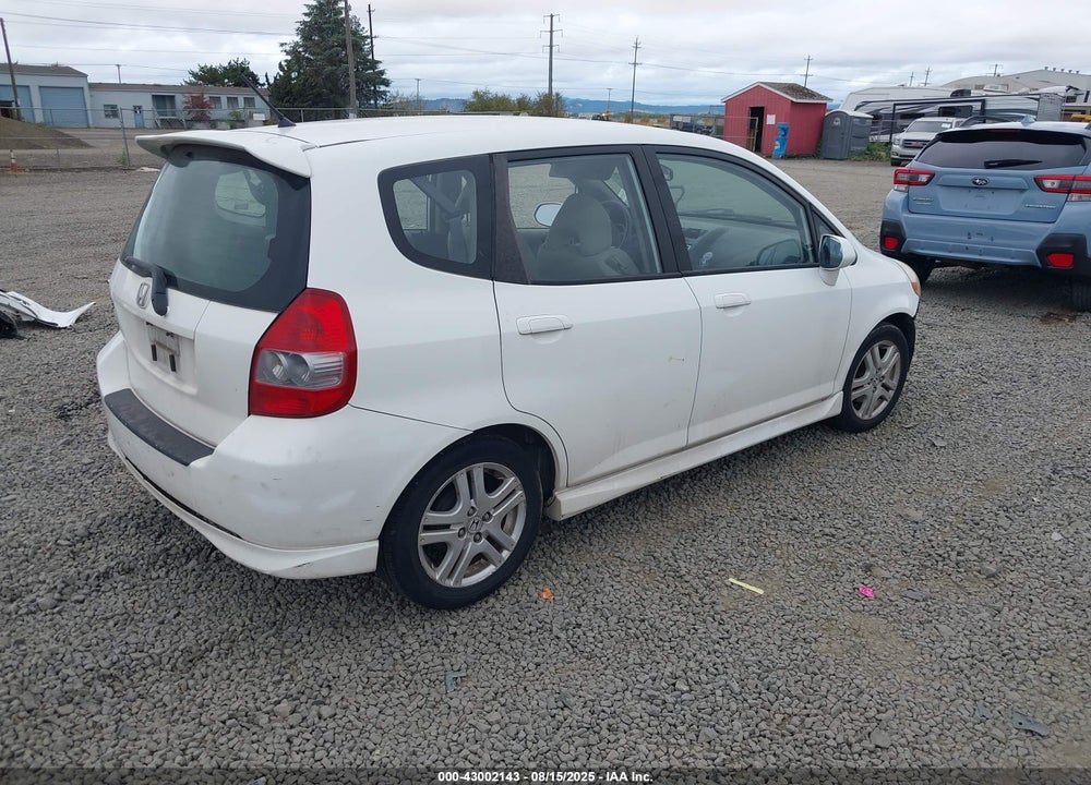 2007 HONDA FIT VIN: JHMGD38637S018423