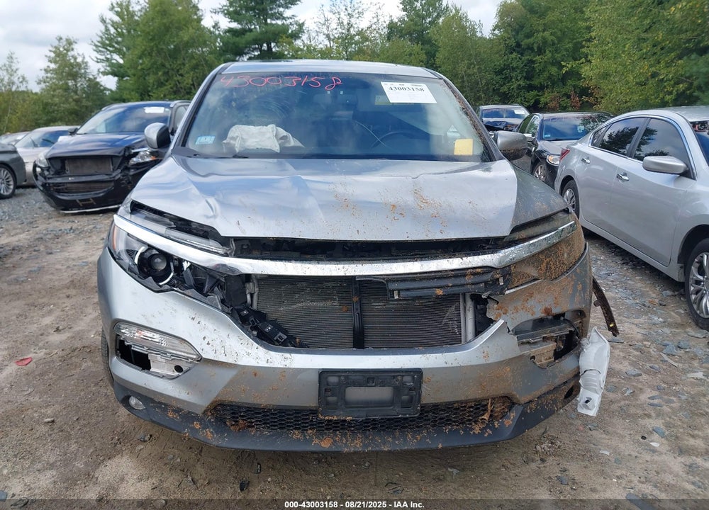 2018 HONDA PILOT EX-L VIN: 5FNYF6H57JB050563
