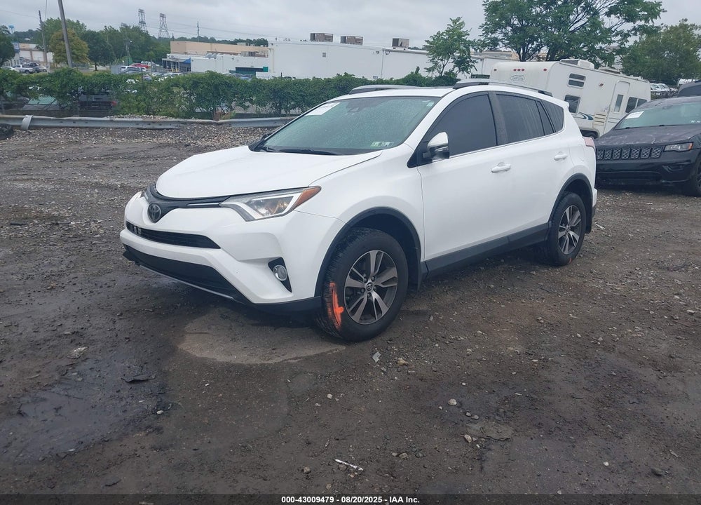2018 TOYOTA RAV4 VIN: 2T3RFREV0JW850593
