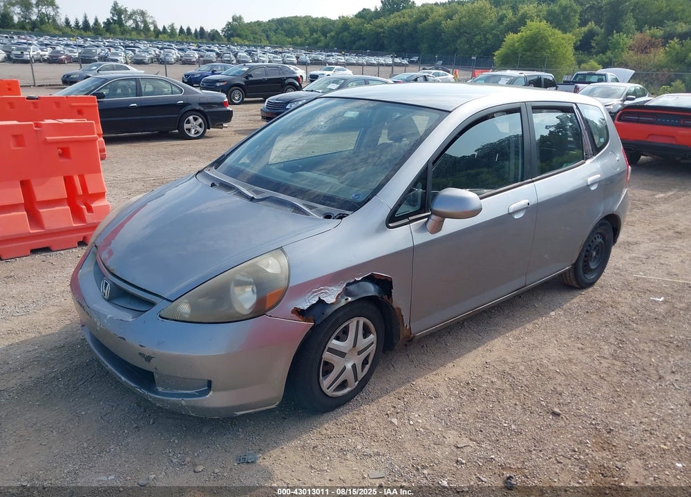 2007 HONDA FIT VIN: JHMGD384X7S036917