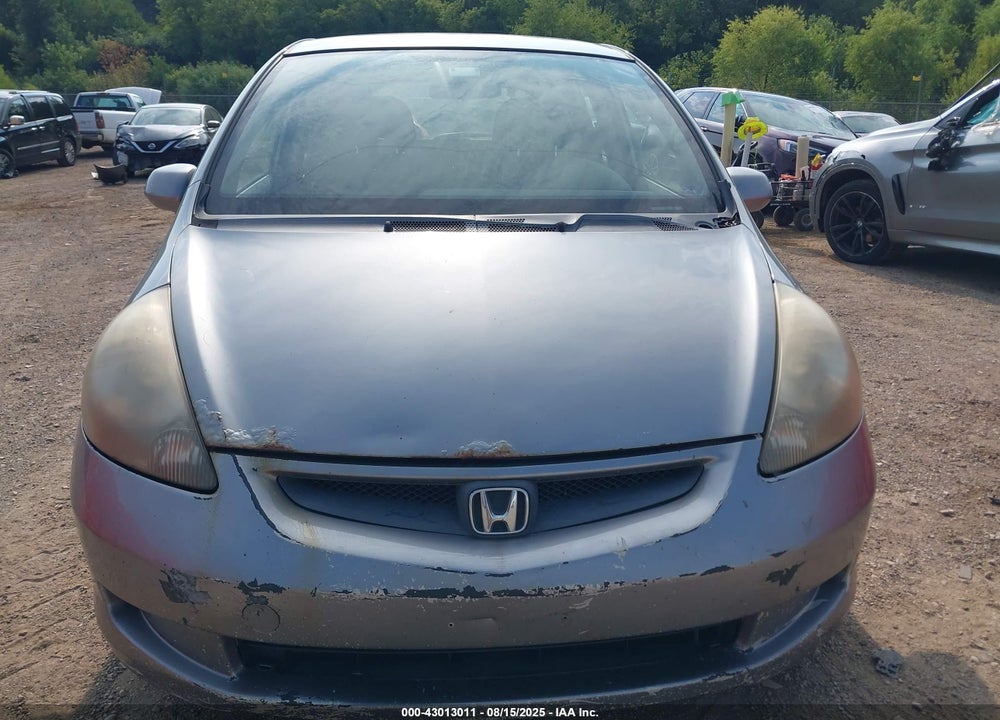 2007 HONDA FIT VIN: JHMGD384X7S036917