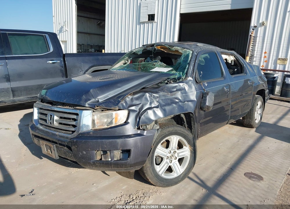 2014 HONDA RIDGELINE RTL VIN: 5FPYK1F58EB003167