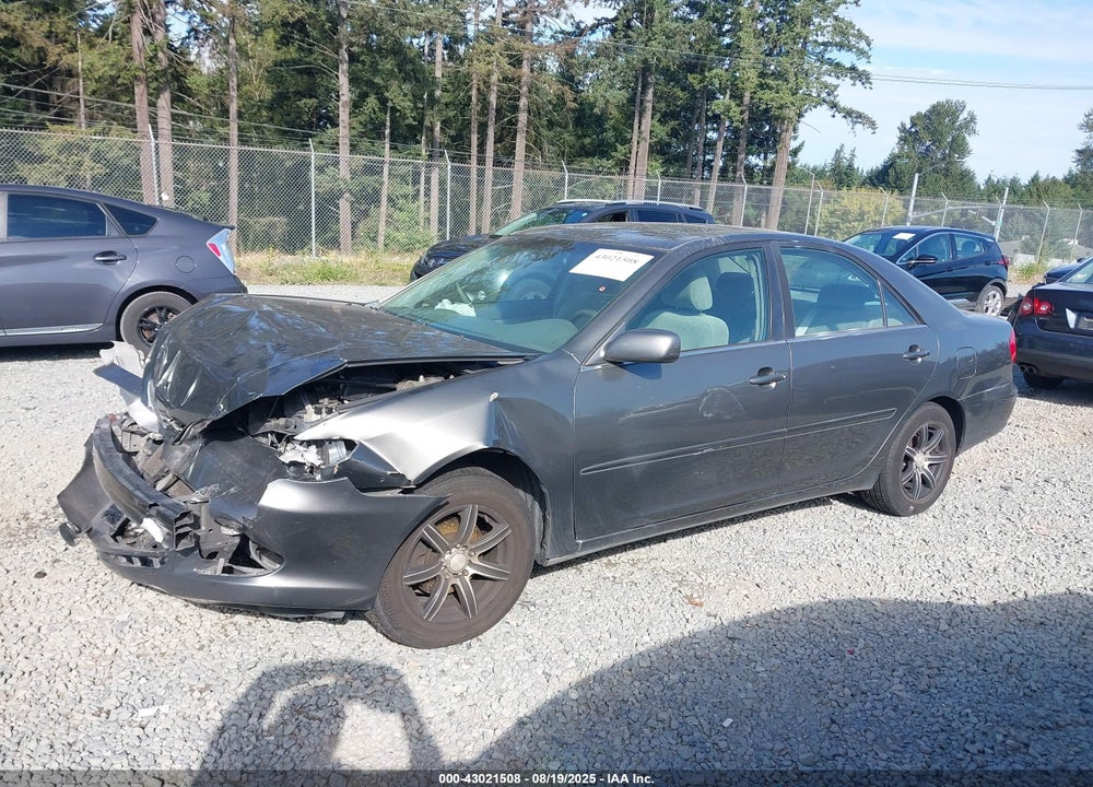 2002 TOYOTA CAMRY LE VIN: JTDBE32K020060079