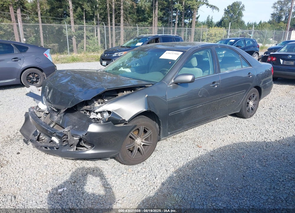 2002 TOYOTA CAMRY LE VIN: JTDBE32K020060079