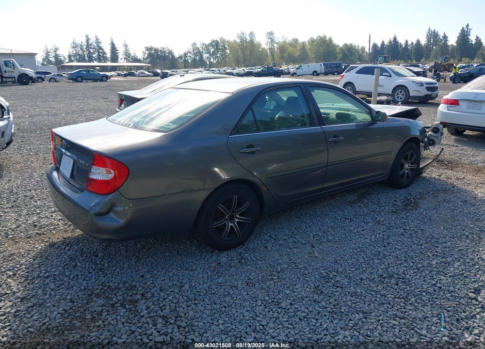 2002 TOYOTA CAMRY LE VIN: JTDBE32K020060079