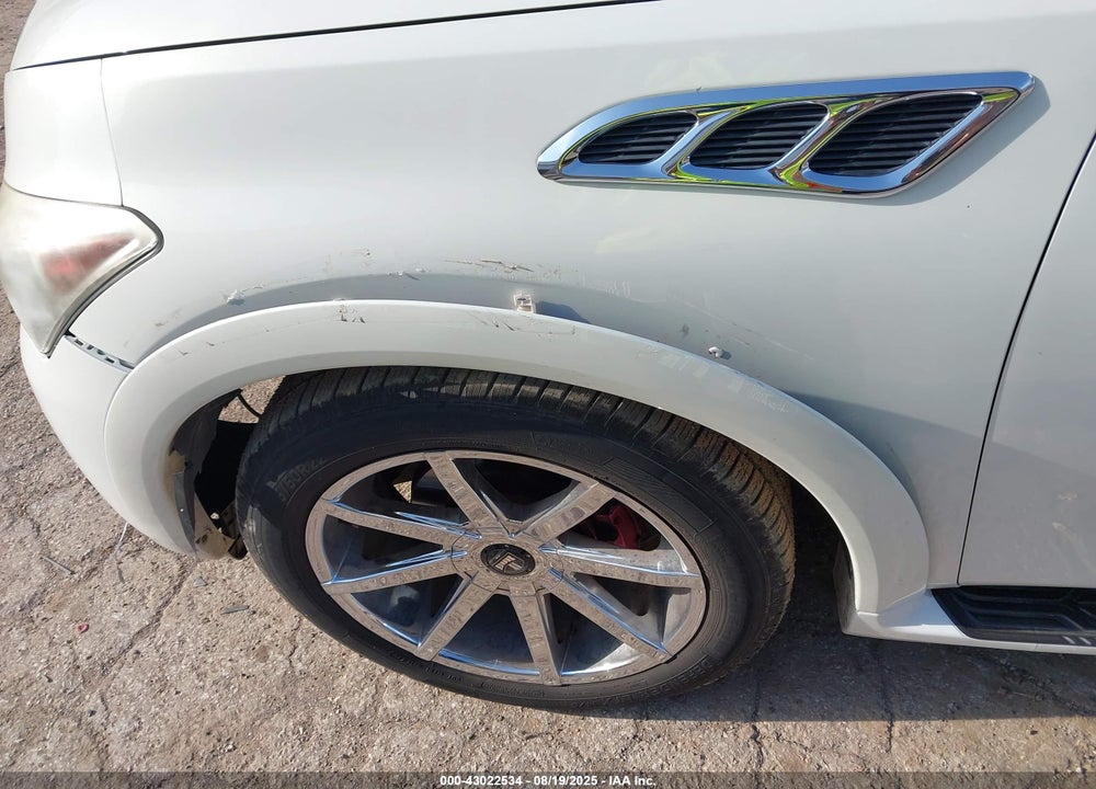 2011 INFINITI QX56 VIN: JN8AZ2NFXB9502083