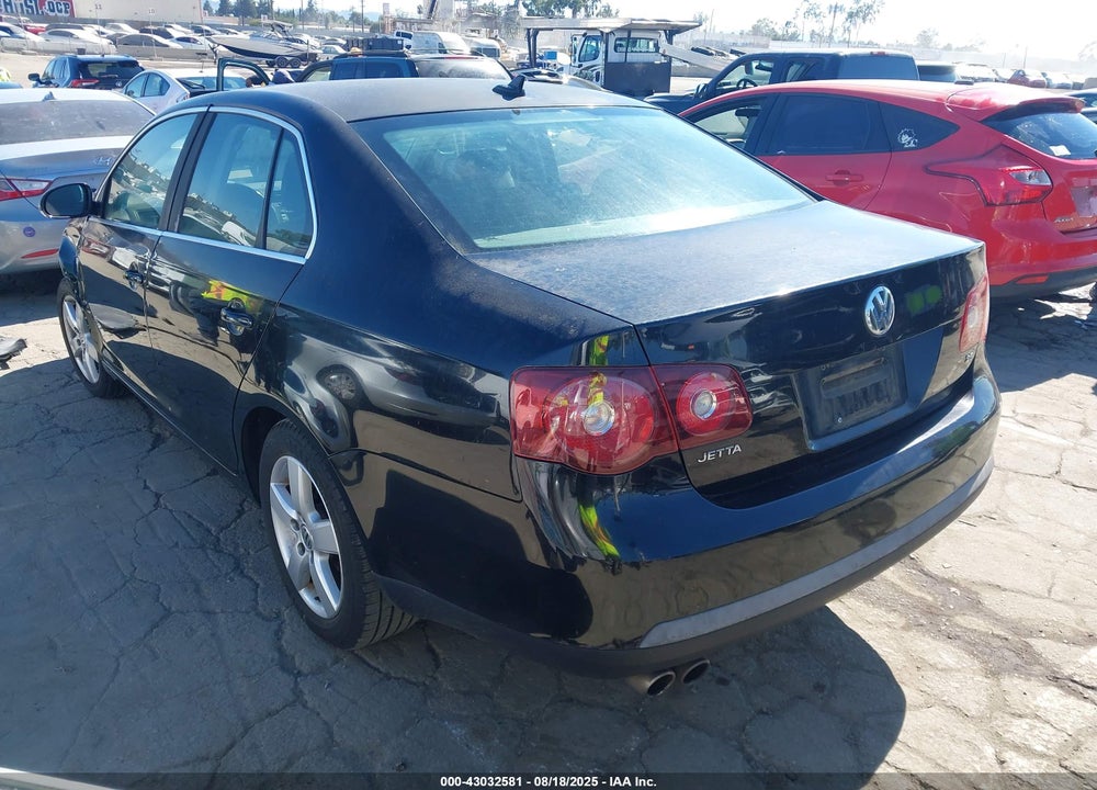 2009 VOLKSWAGEN JETTA VIN: 3VWRZ71KX9M140585