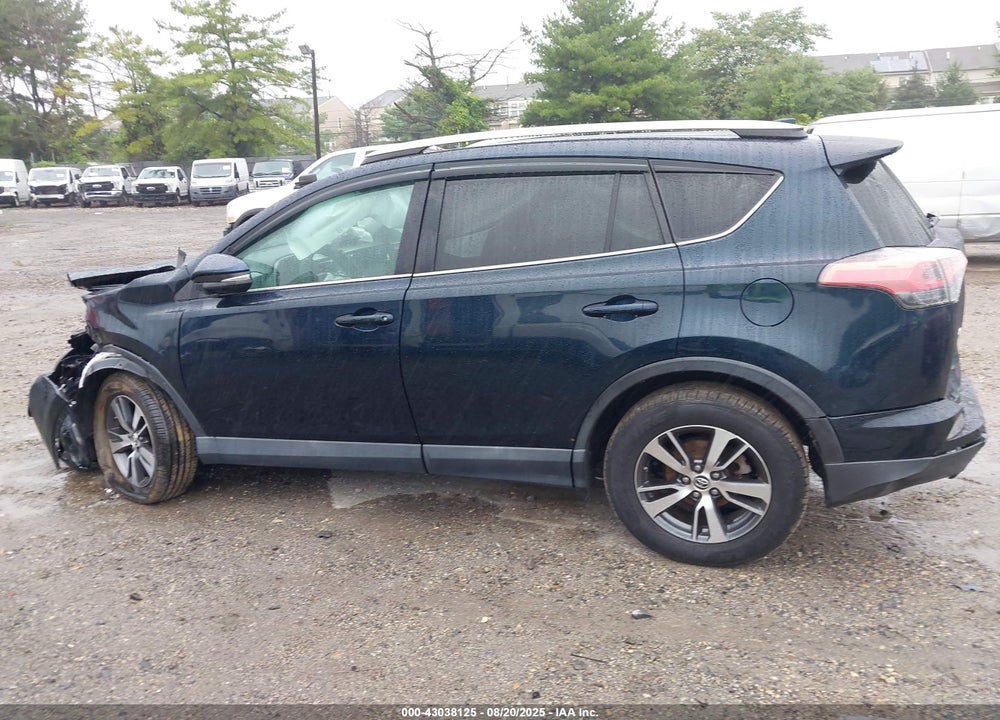 2018 TOYOTA RAV4 VIN: 2T3RFREV1JW706180