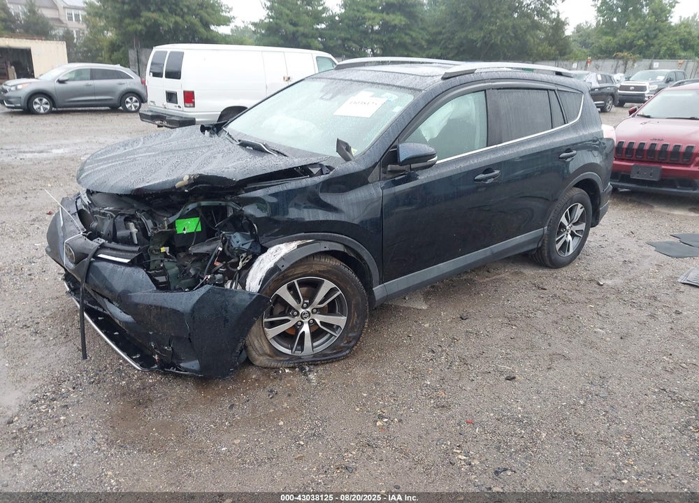 2018 TOYOTA RAV4 VIN: 2T3RFREV1JW706180