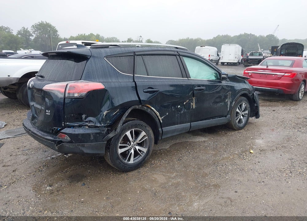 2018 TOYOTA RAV4 VIN: 2T3RFREV1JW706180