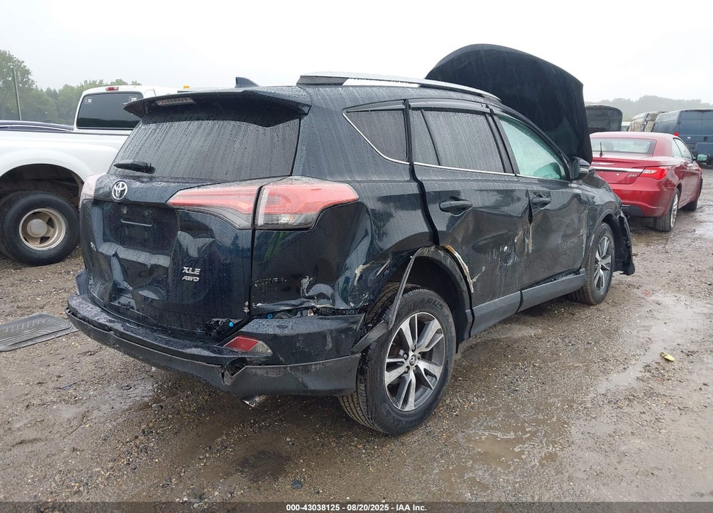 2018 TOYOTA RAV4 VIN: 2T3RFREV1JW706180