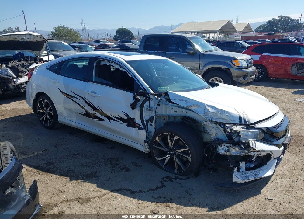 2018 HONDA CIVIC VIN: 2HGFC1E56JH704245