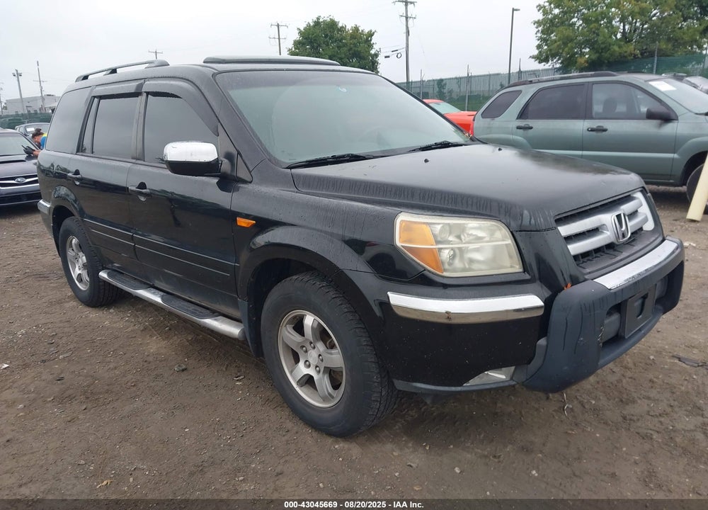 2007 HONDA PILOT EX-L VIN: 5FNYF28707B011736