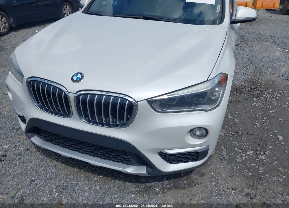 2017 BMW X1 VIN: WBXHU7C37H5H33060
