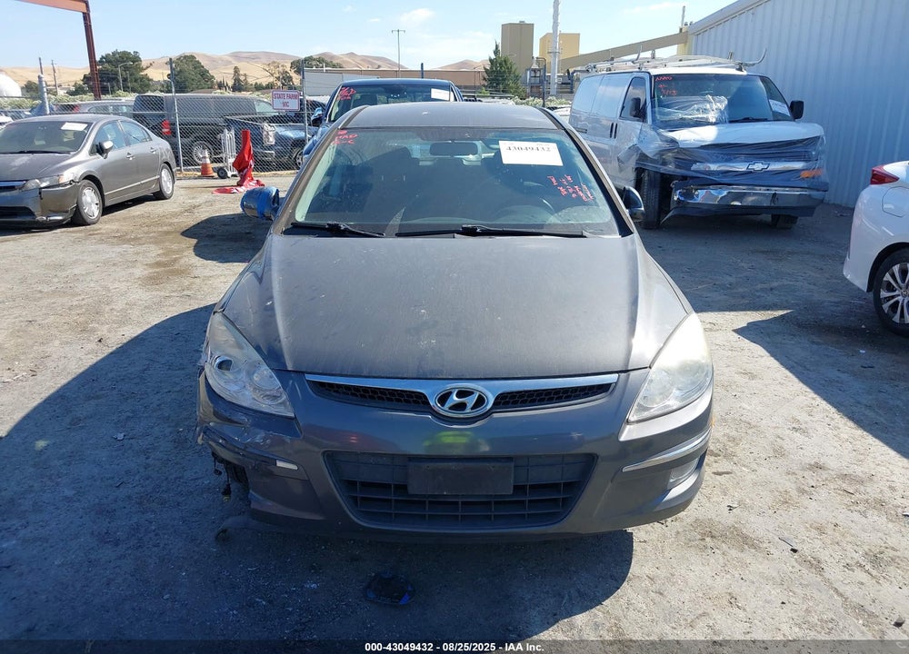 2009 HYUNDAI ELANTRA TOURING VIN: KMHDC86E09U039070