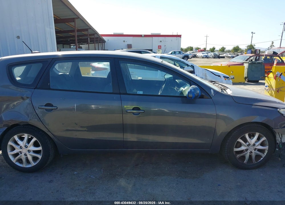 2009 HYUNDAI ELANTRA TOURING VIN: KMHDC86E09U039070