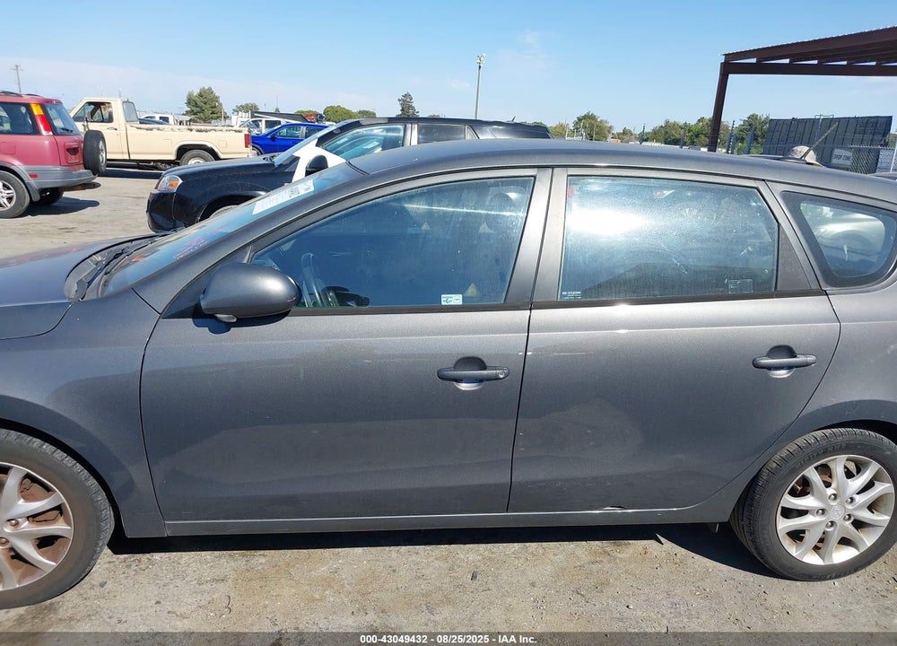 2009 HYUNDAI ELANTRA TOURING VIN: KMHDC86E09U039070