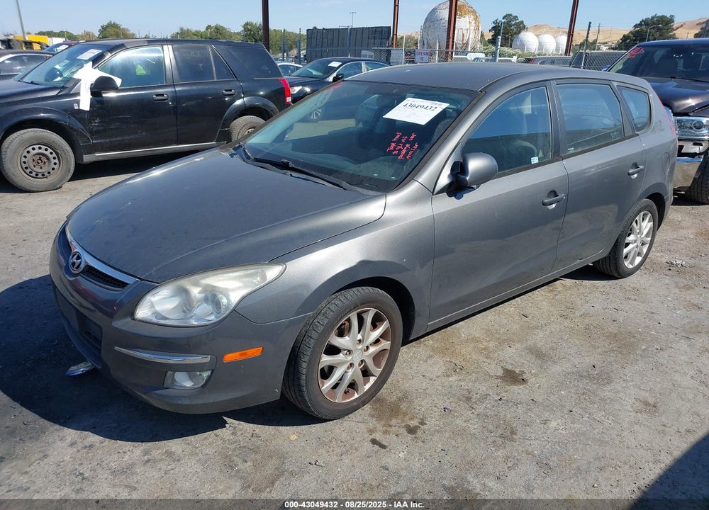 2009 HYUNDAI ELANTRA TOURING VIN: KMHDC86E09U039070