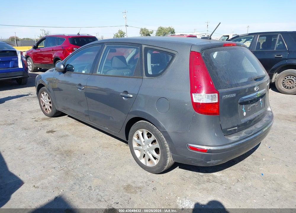 2009 HYUNDAI ELANTRA TOURING VIN: KMHDC86E09U039070