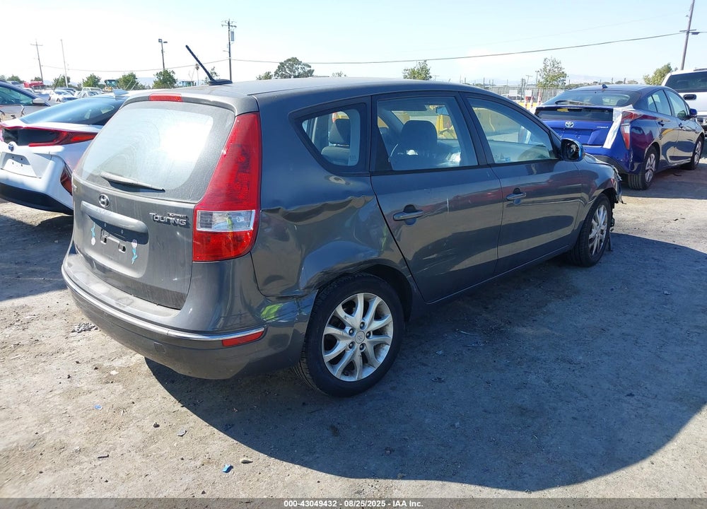 2009 HYUNDAI ELANTRA TOURING VIN: KMHDC86E09U039070