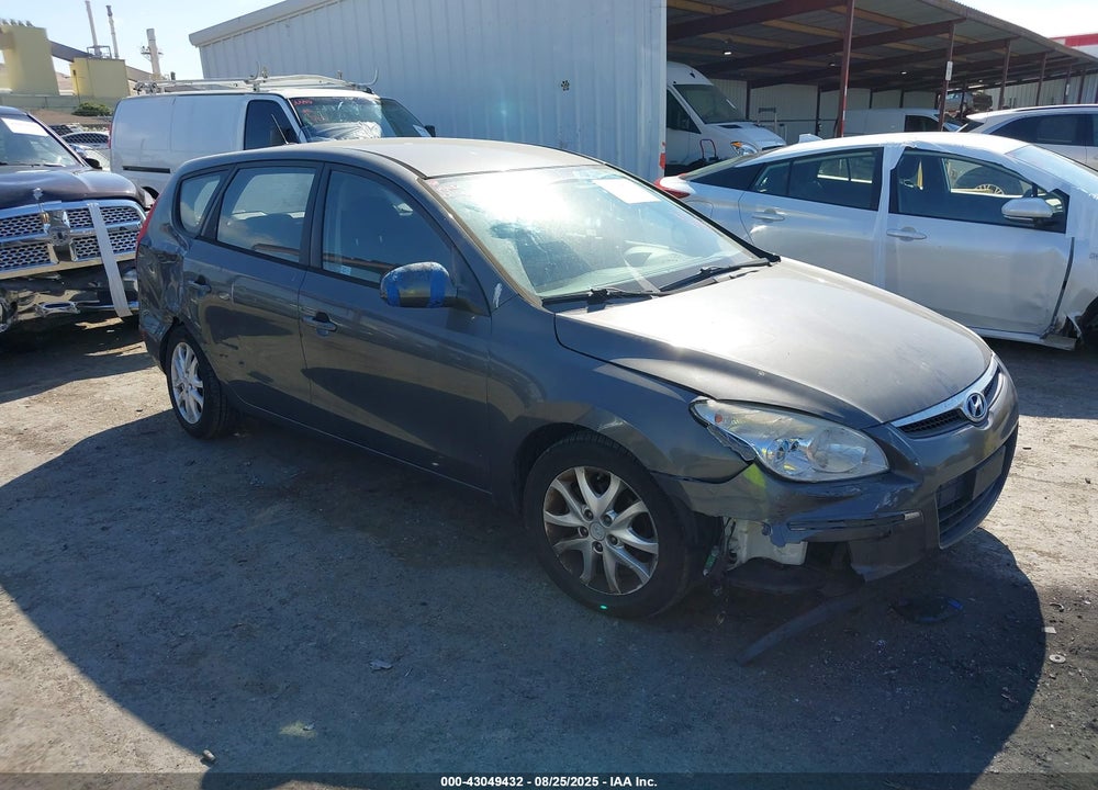 2009 HYUNDAI ELANTRA TOURING VIN: KMHDC86E09U039070