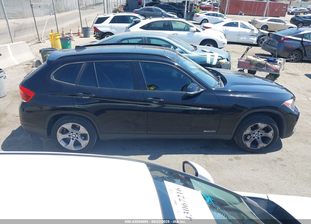 2013 BMW X1 VIN: WBAVM1C59DVW42018