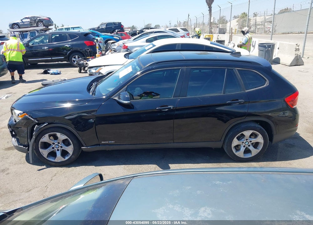 2013 BMW X1 VIN: WBAVM1C59DVW42018