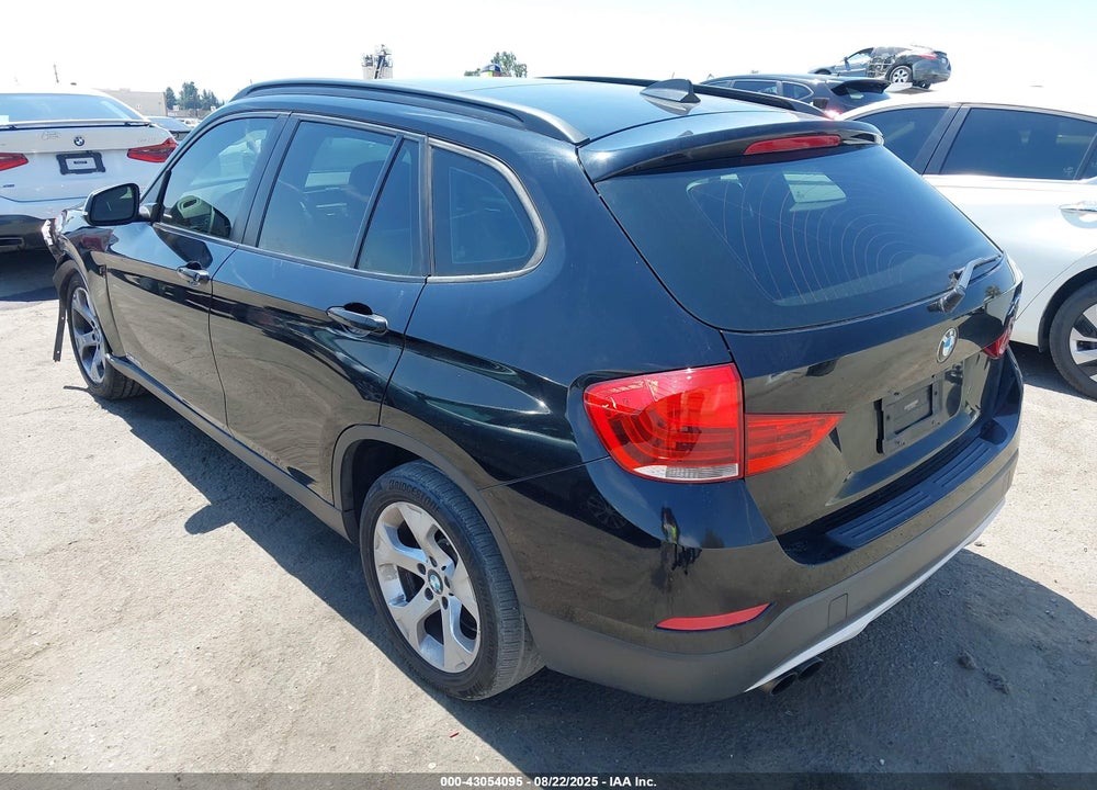 2013 BMW X1 VIN: WBAVM1C59DVW42018