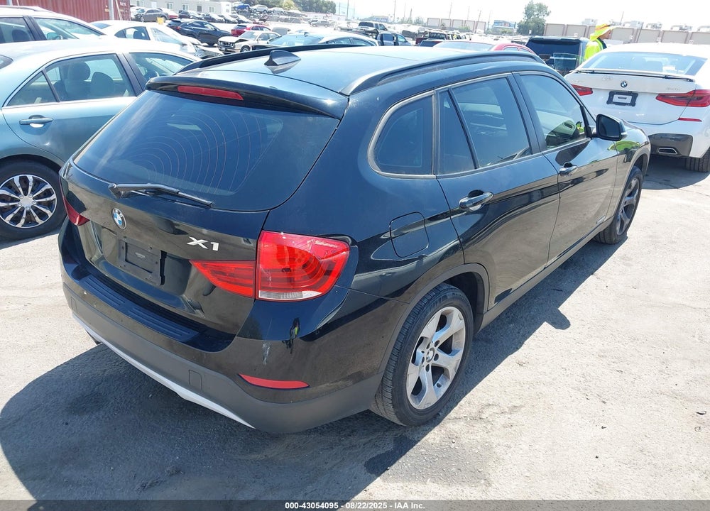 2013 BMW X1 VIN: WBAVM1C59DVW42018