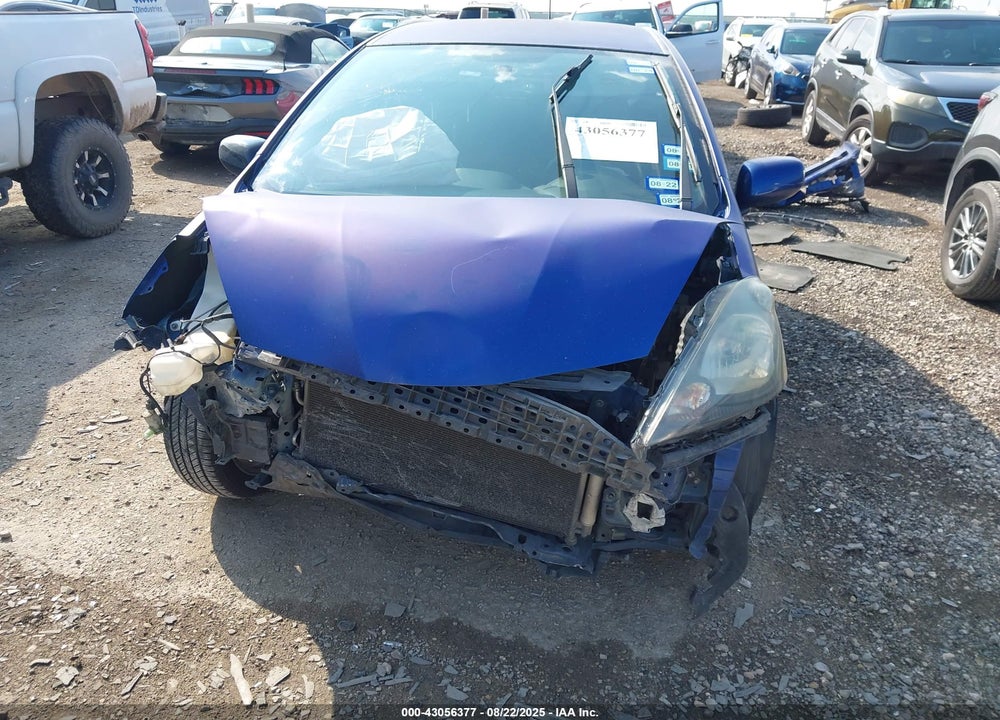 2009 HONDA FIT VIN: JHMGE87499S004927