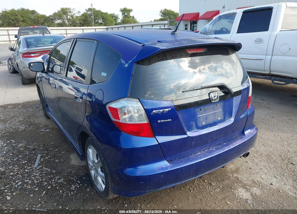 2009 HONDA FIT VIN: JHMGE87499S004927