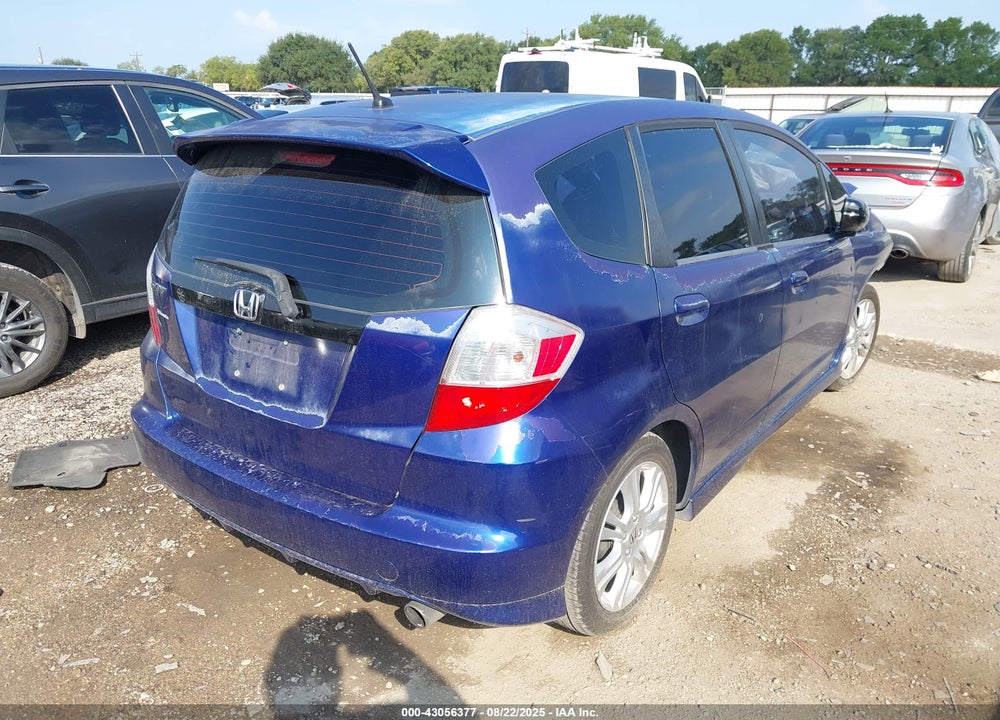 2009 HONDA FIT VIN: JHMGE87499S004927