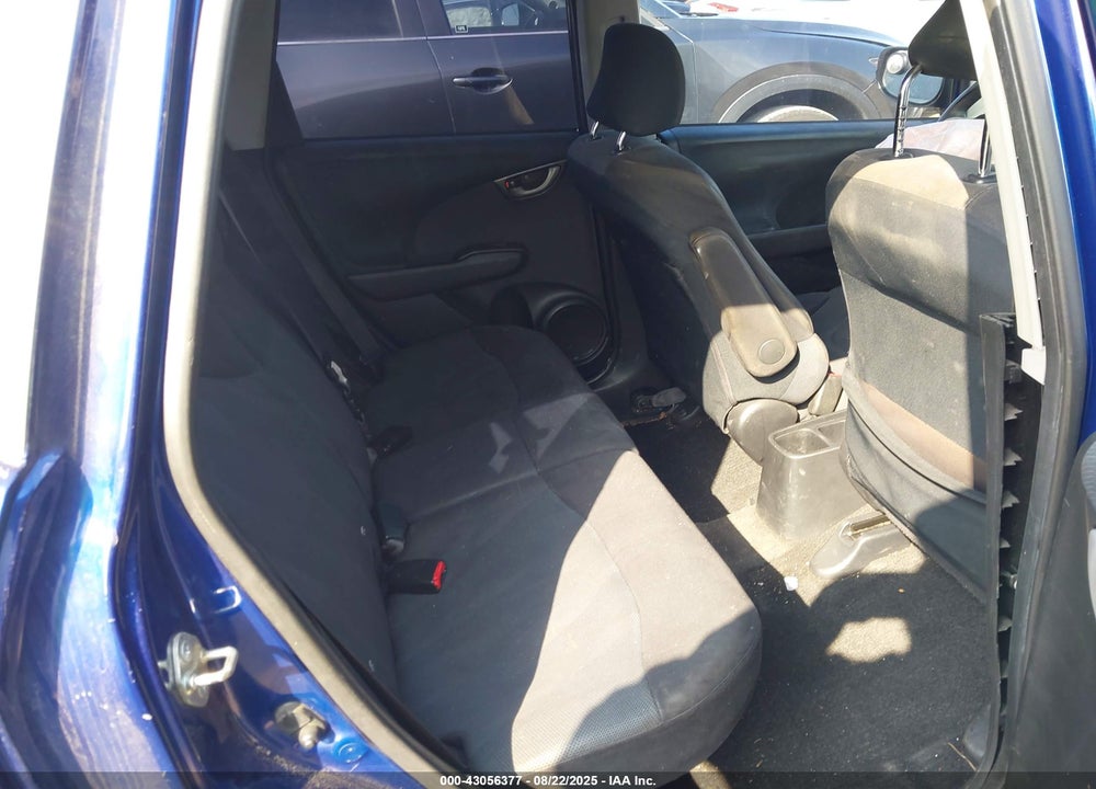 2009 HONDA FIT VIN: JHMGE87499S004927